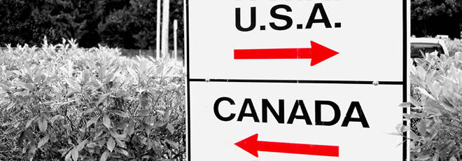 Sign on the border between Canada and the U.S.A.