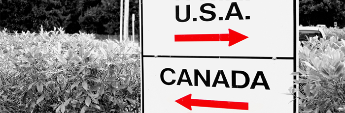 Sign on the border between Canada and the U.S.A.