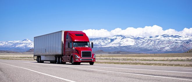 truck driving along highway.