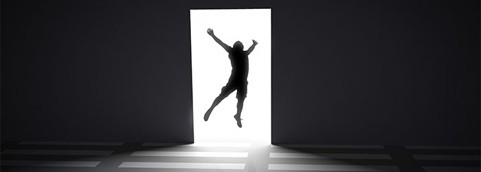 person jumping in doorway