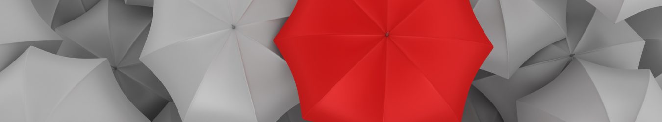 Red Umbrella with Many Gray Ones